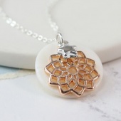 Silver plated, rose gold plated mandala pearl disc necklace.